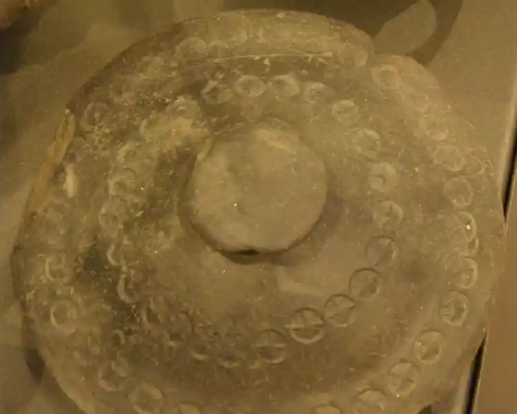 Clay lid, solar crosses forming a solar disc